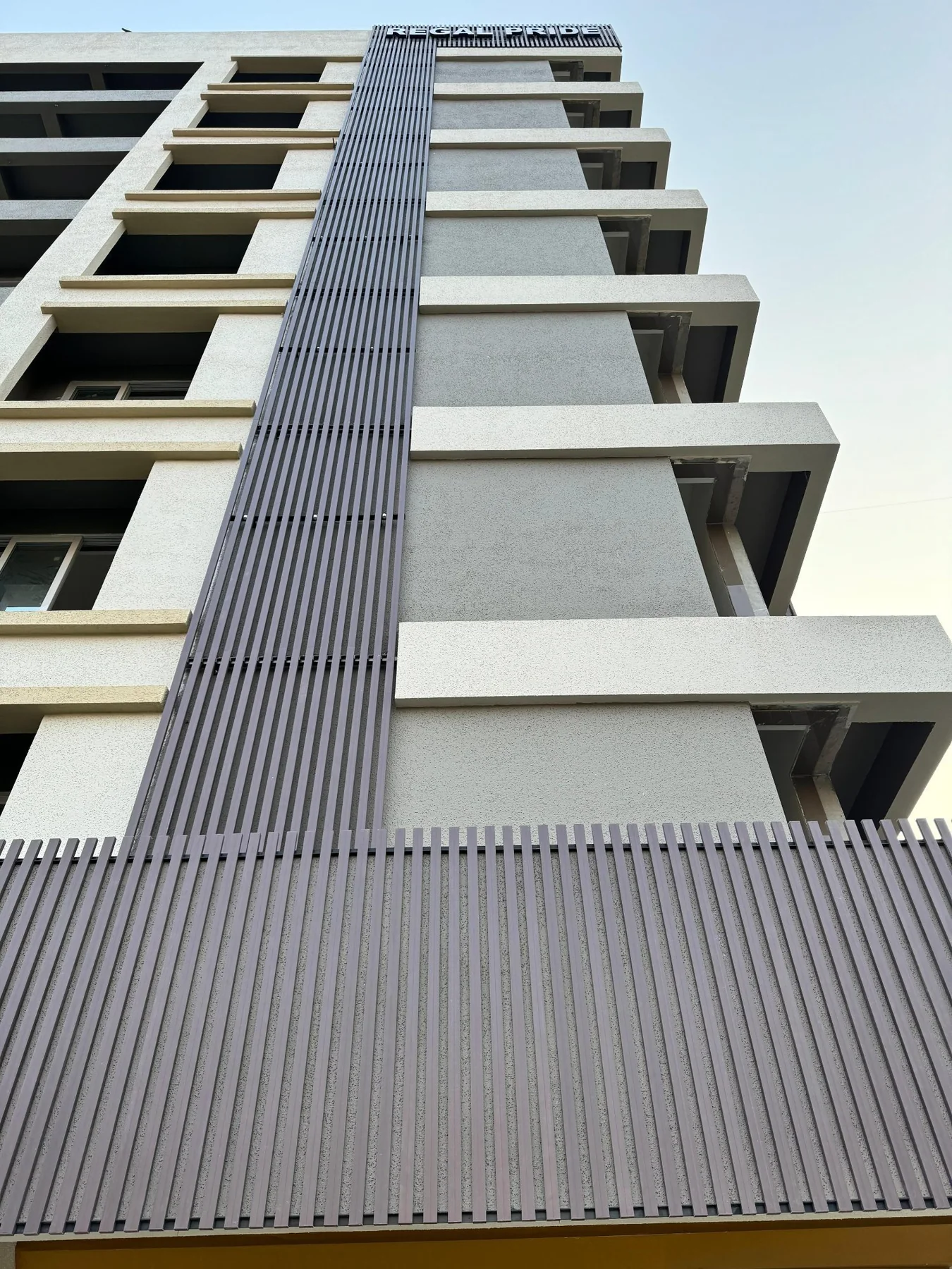 Exterior facade design featuring UPVC screening and balcony detailing
